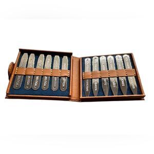 Set of 12 engraved silver dress shirt collar stays leather case